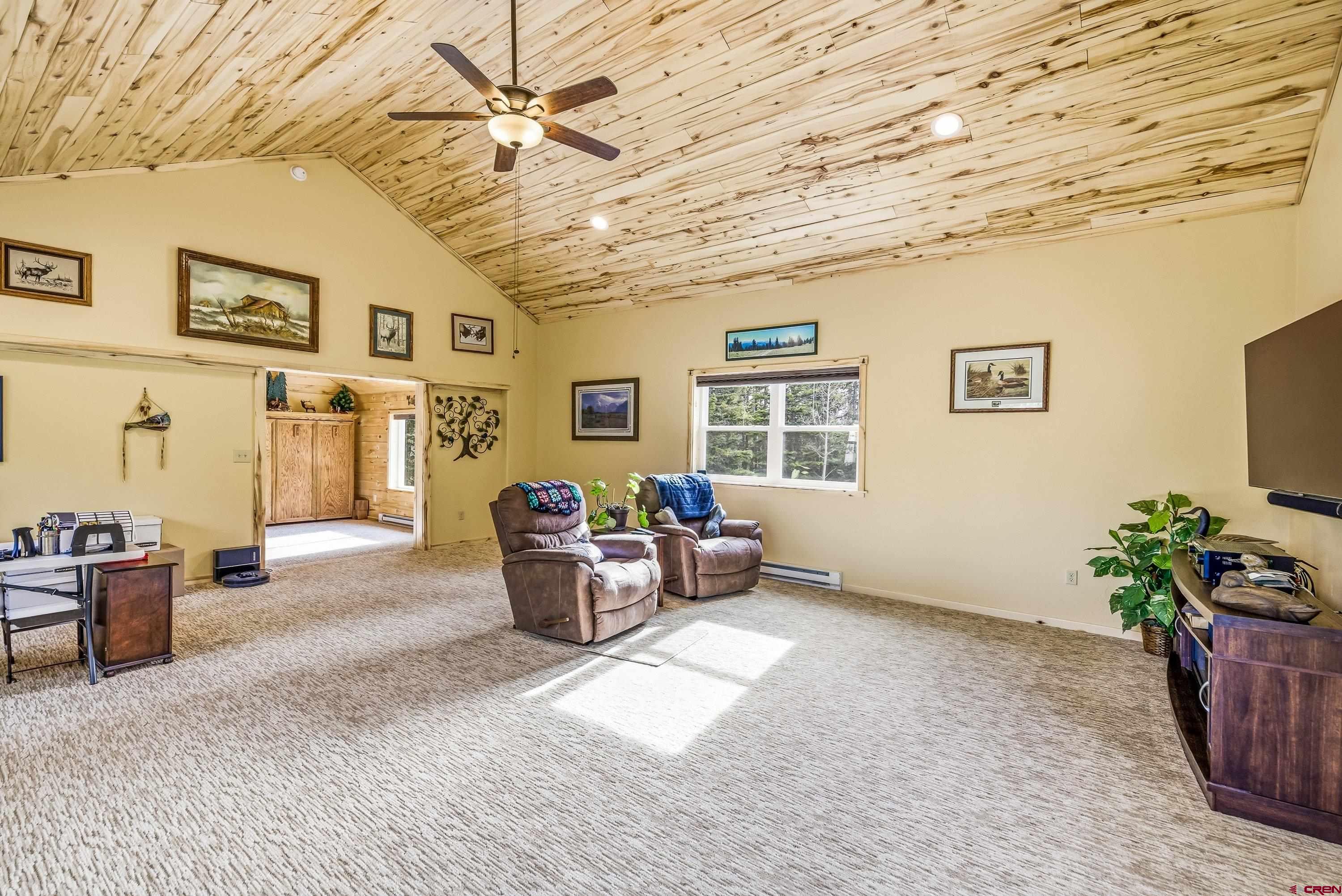 200 Lake Road Cimarron, CO 81220 - Photo 16 of 45 a living room with furniture and a window
