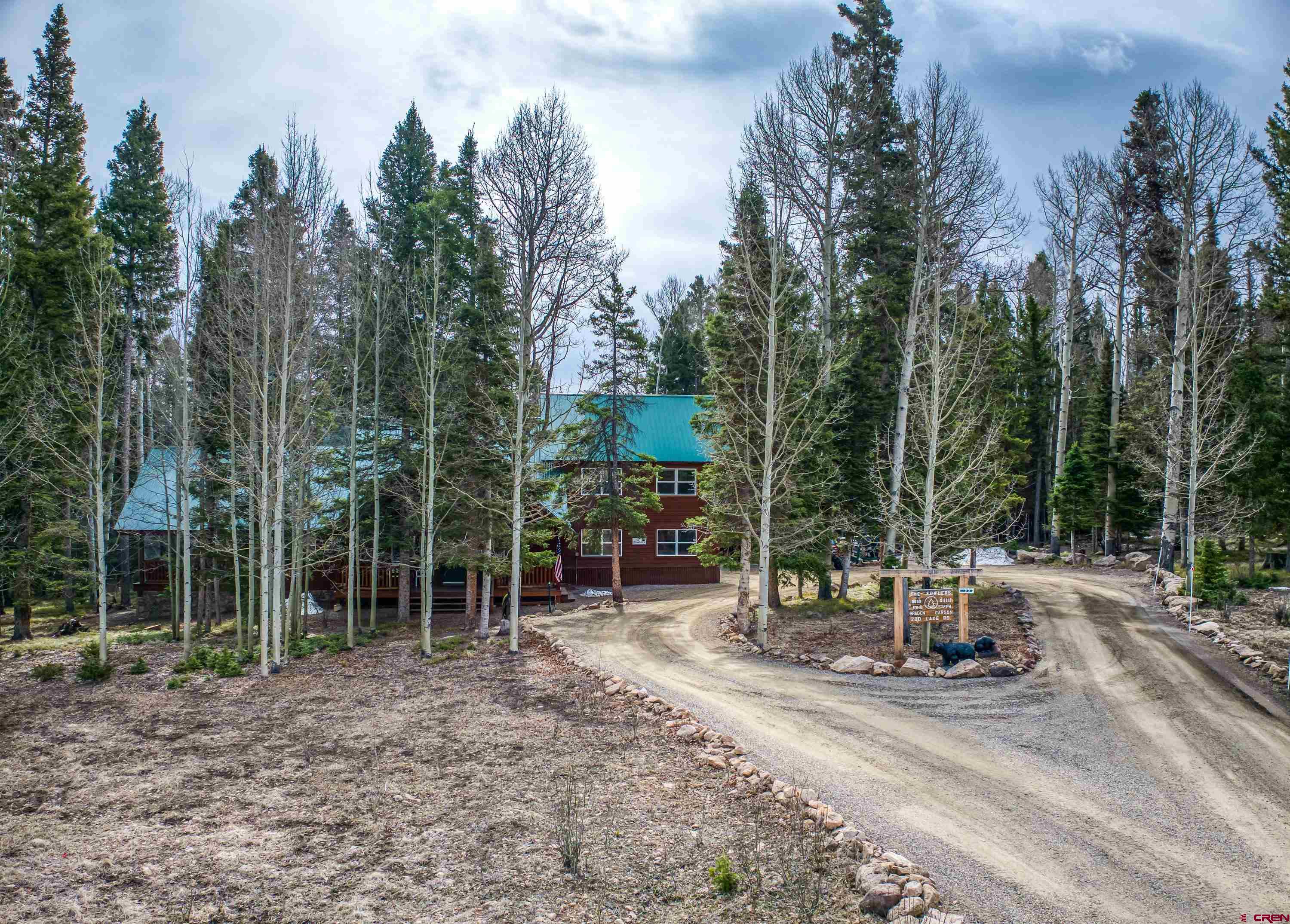 200 Lake Road Cimarron, CO 81220 - Photo 32 of 45 a view of a park with large trees