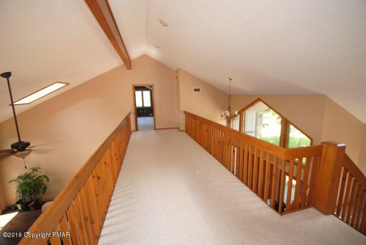154 Bowman Road Mount Pocono, PA 18344 - Photo 25 of 41 a view of a hallway with stairs