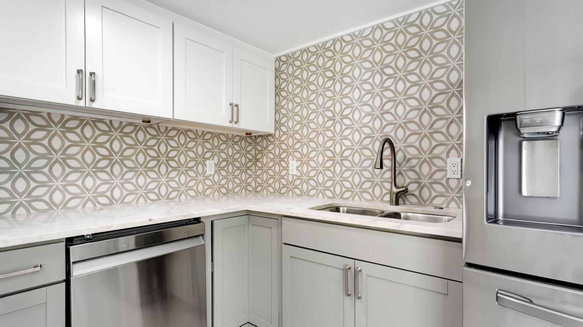 9709 Southwest 1st Place Boca Raton, FL 33428 - Photo 17 of 32 a bathroom with a sink and a mirror