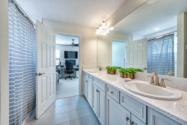 a bed room with furniture and a window