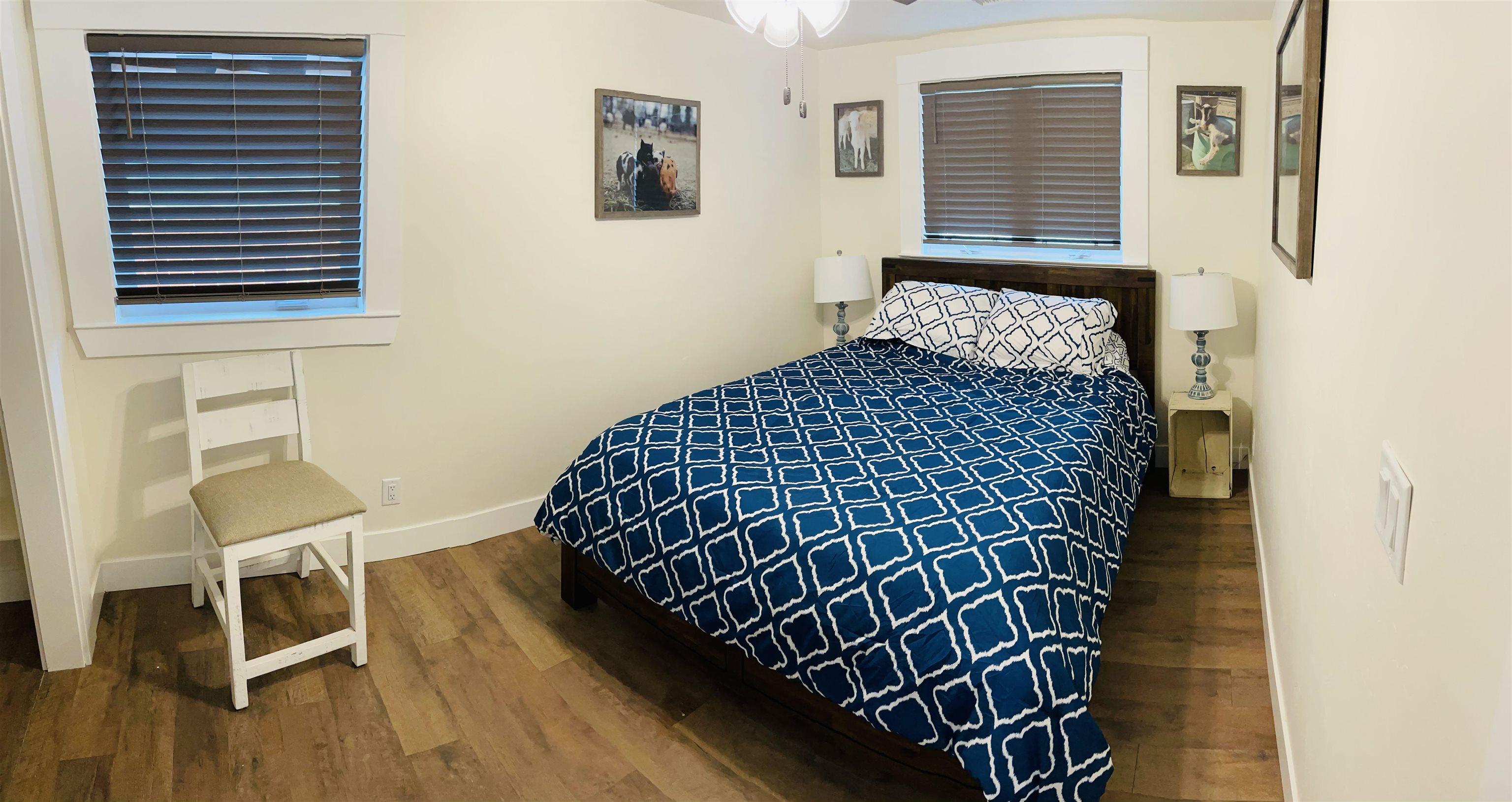 159 North Willow Street Fruita, CO 81521 - Photo 6 of 9 a bedroom with a bed and a chair