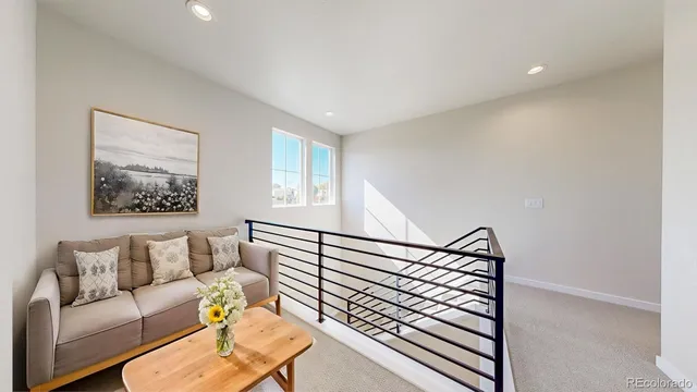 a view of a hallway with windows