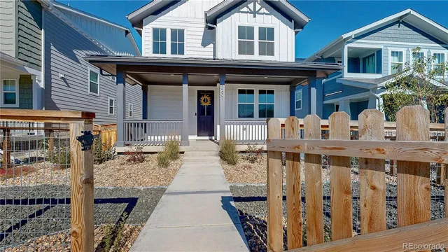 a aerial view of a house with a yard