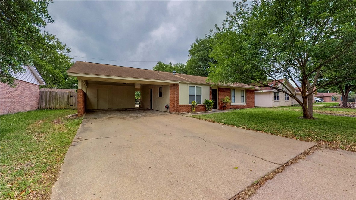 1108 Forest Glen Court Bryan, TX 77803 - Photo 1 of 26 a house view with a garden space
