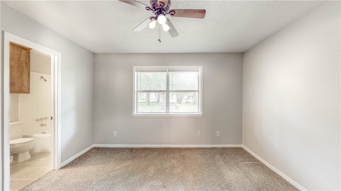 1108 Forest Glen Court Bryan, TX 77803 - Photo 16 of 26 a view of an empty room with a window