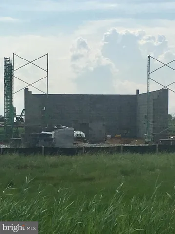 a front view of a building with balcony