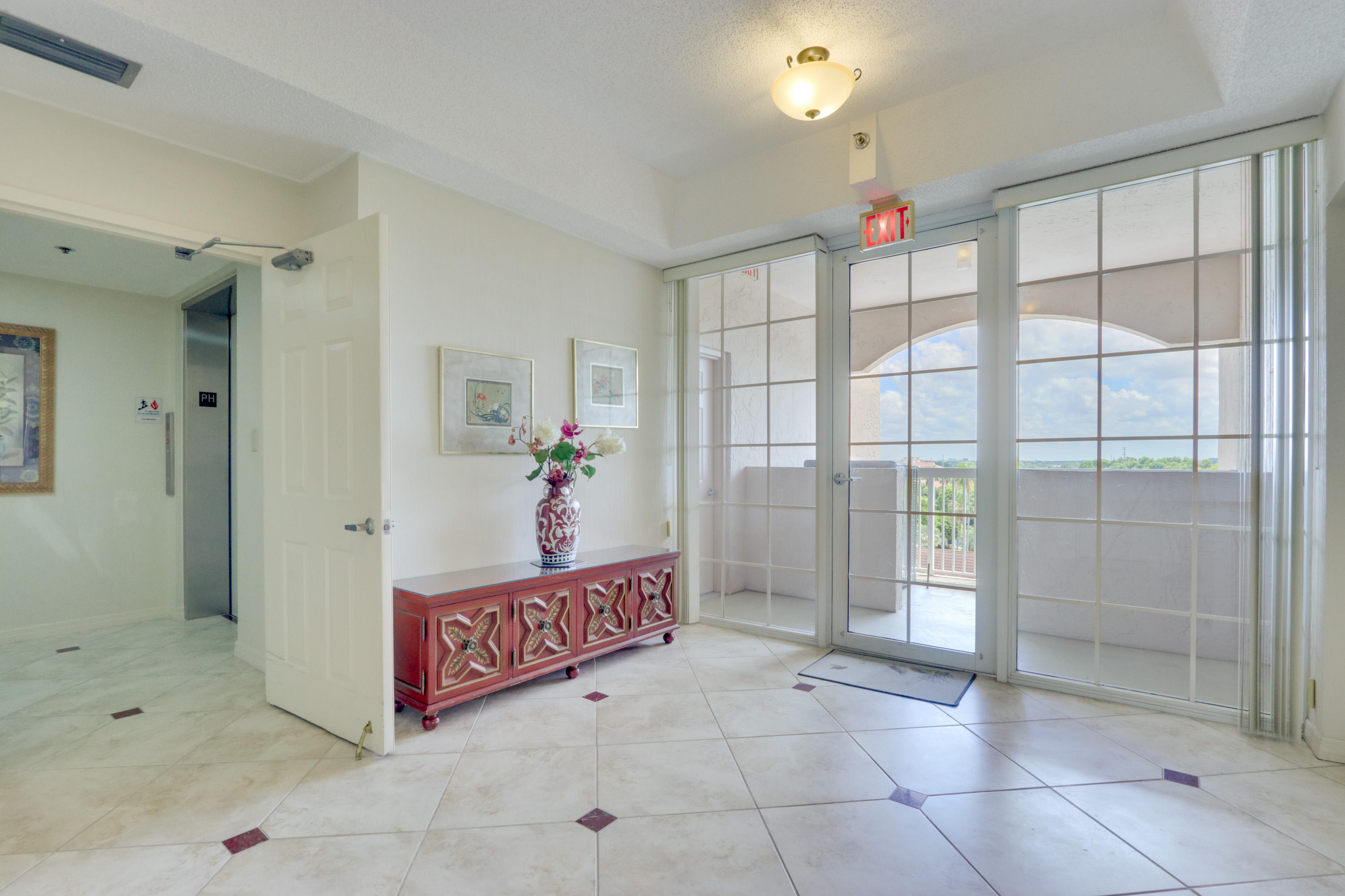 17031 Boca Club Boulevard, Unit 106A Boca Raton, FL 33487 - Photo 15 of 60 6th floor elevator lobby 1