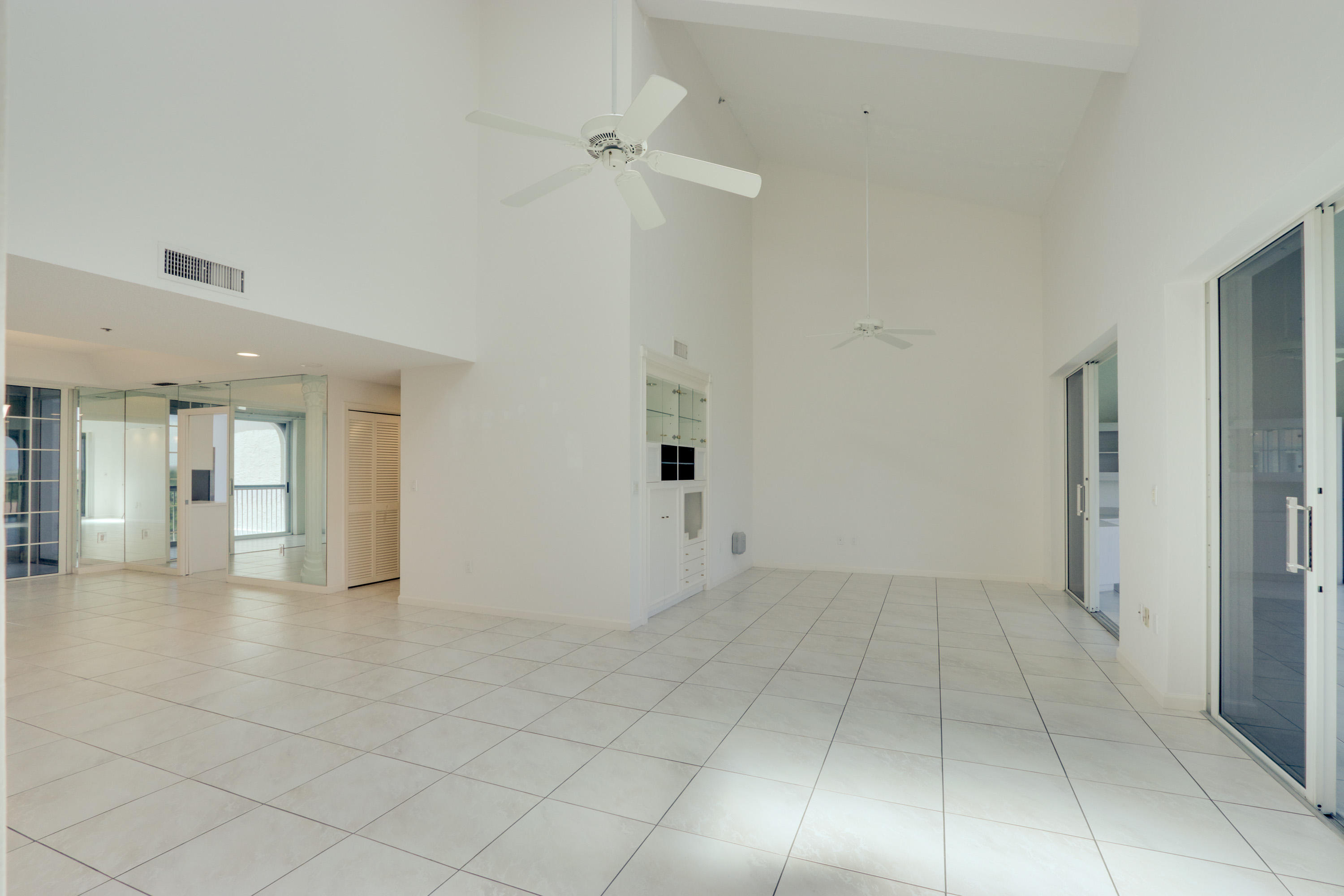 17031 Boca Club Boulevard, Unit 106A Boca Raton, FL 33487 - Photo 18 of 60 Living Room view to Den area