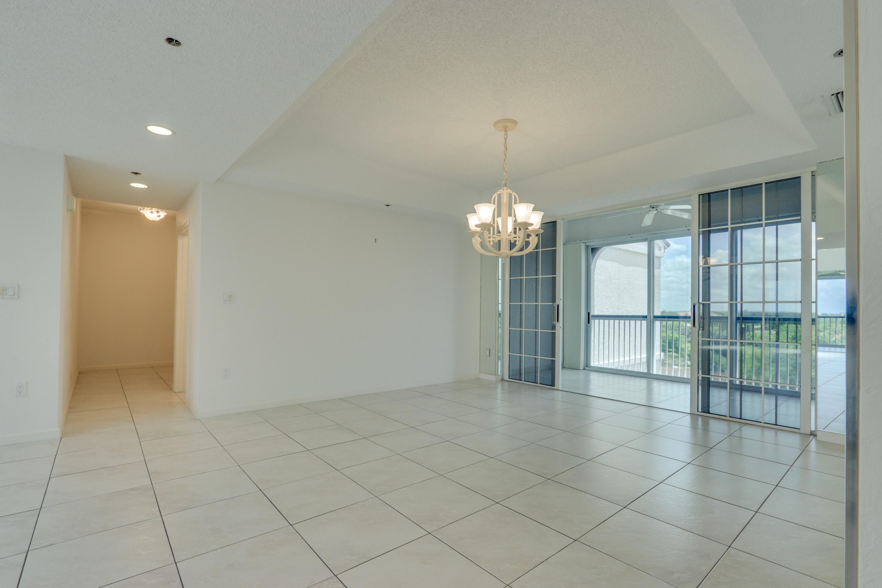 17031 Boca Club Boulevard, Unit 106A Boca Raton, FL 33487 - Photo 21 of 60 Formal Dining Room view to Foyer hallway