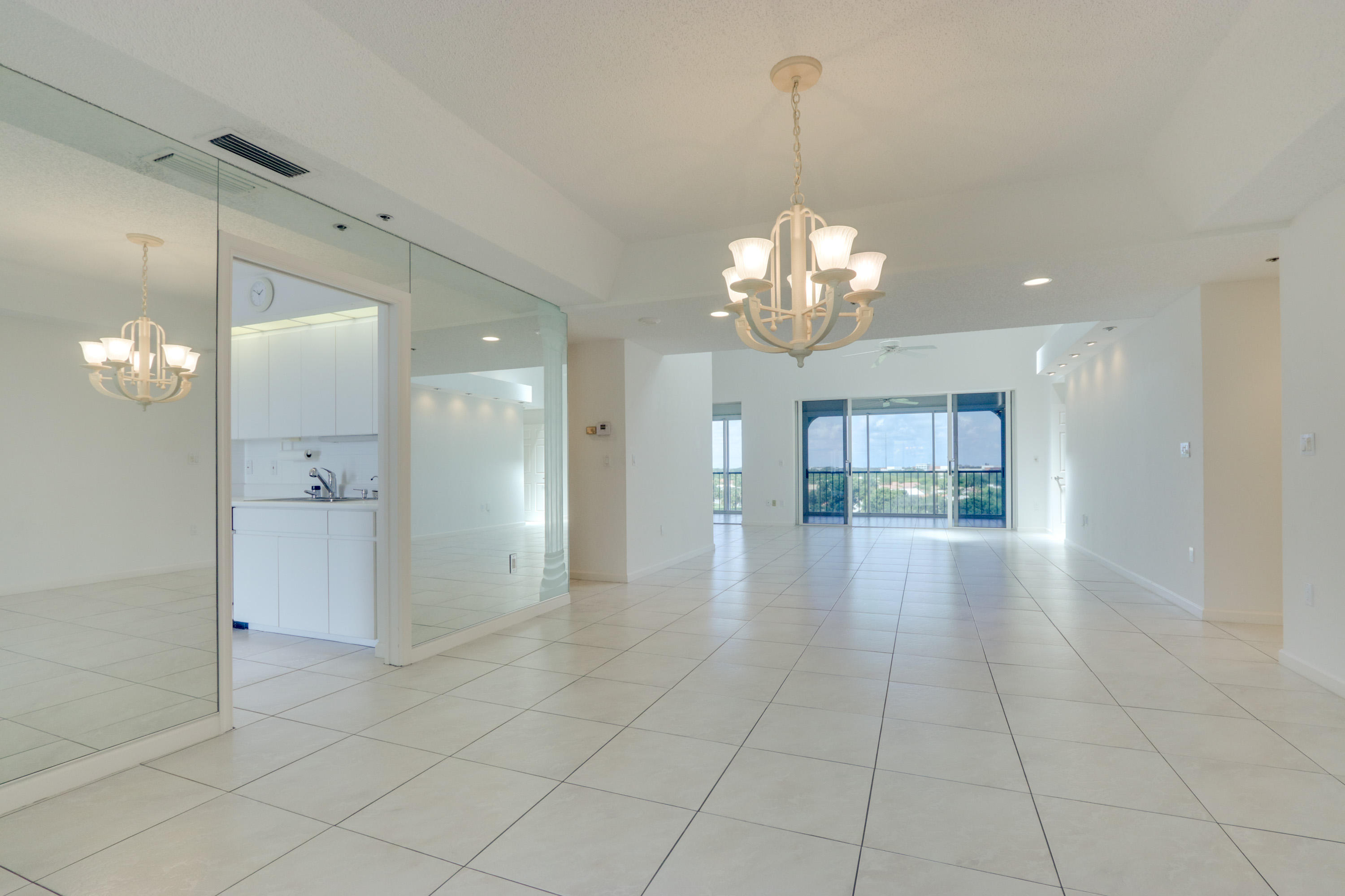 17031 Boca Club Boulevard, Unit 106A Boca Raton, FL 33487 - Photo 22 of 60 Formal Dining Room view to Kitchen & Liv