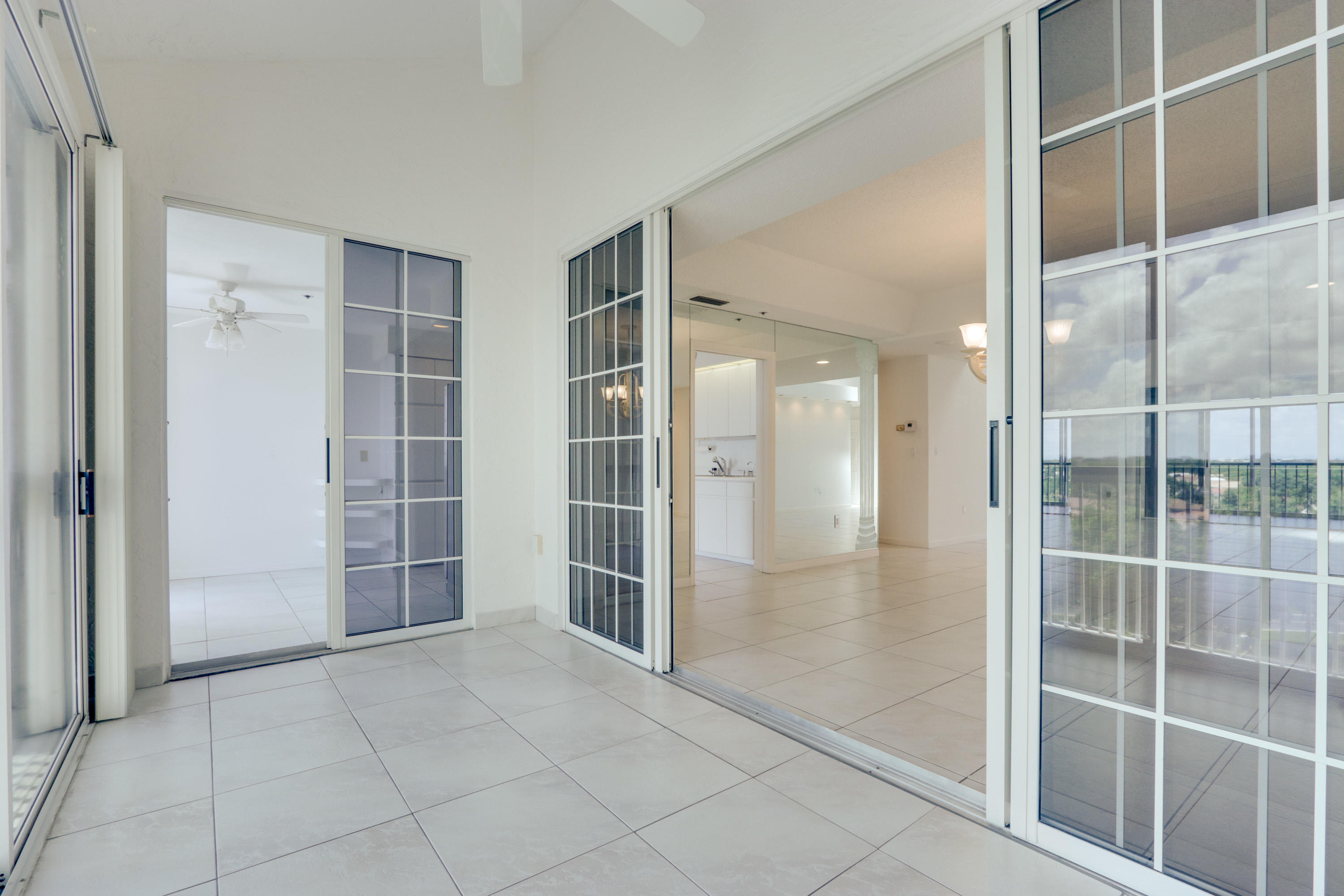 17031 Boca Club Boulevard, Unit 106A Boca Raton, FL 33487 - Photo 27 of 60 Main terrace view towards kitchen