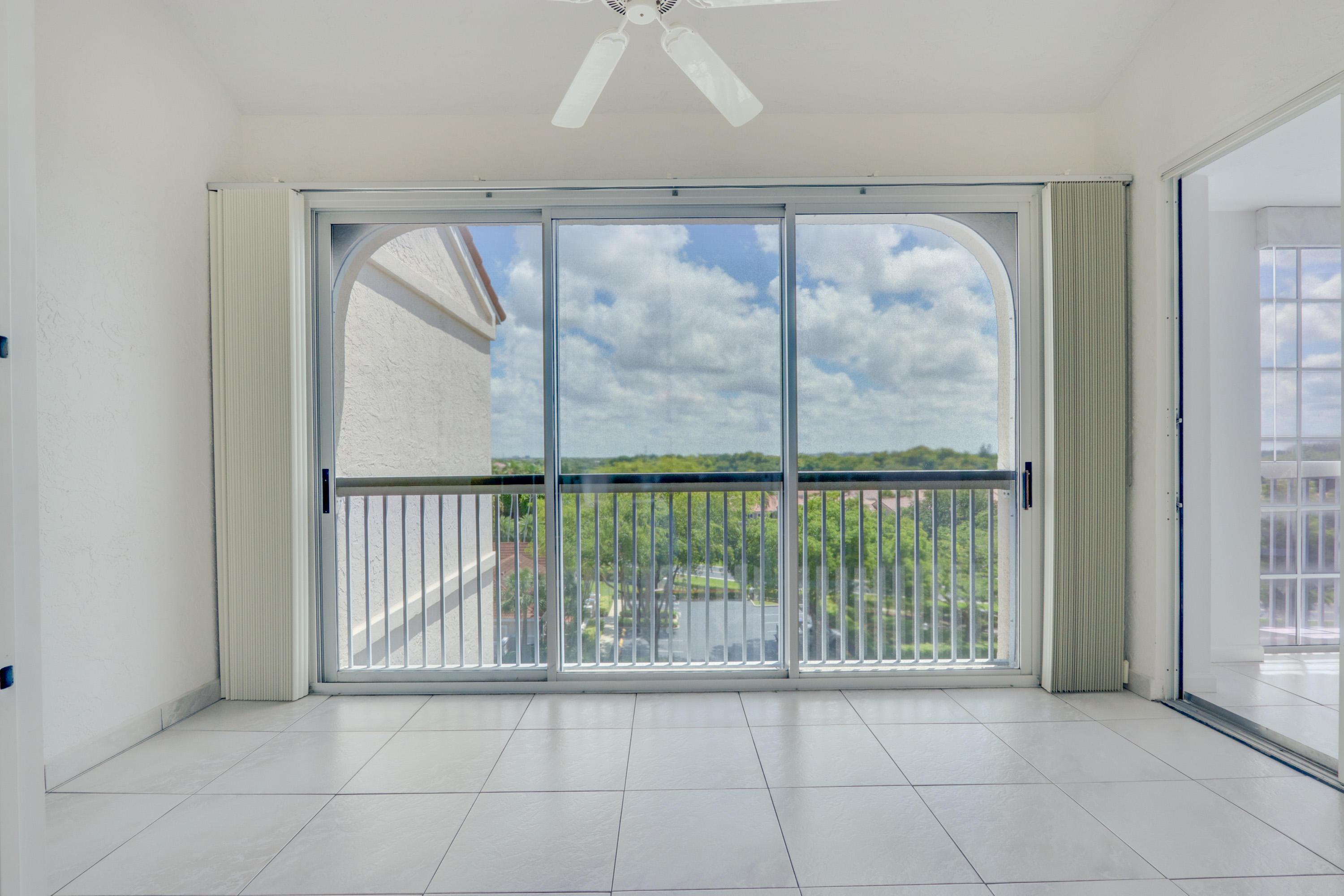 17031 Boca Club Boulevard, Unit 106A Boca Raton, FL 33487 - Photo 28 of 60 Terrace off Dining Room & Kitchen