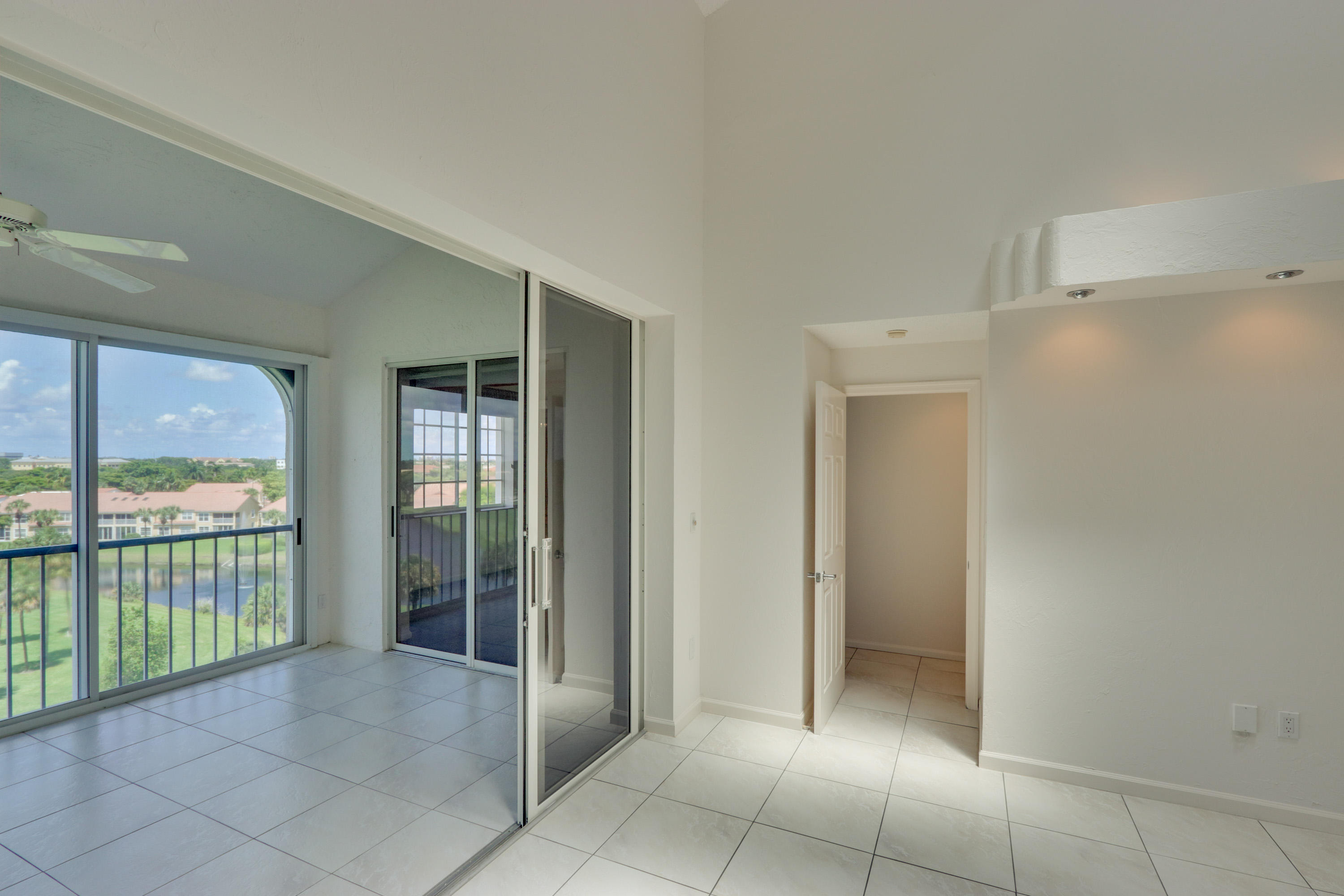 17031 Boca Club Boulevard, Unit 106A Boca Raton, FL 33487 - Photo 29 of 60 Hallway to Master Bedroom