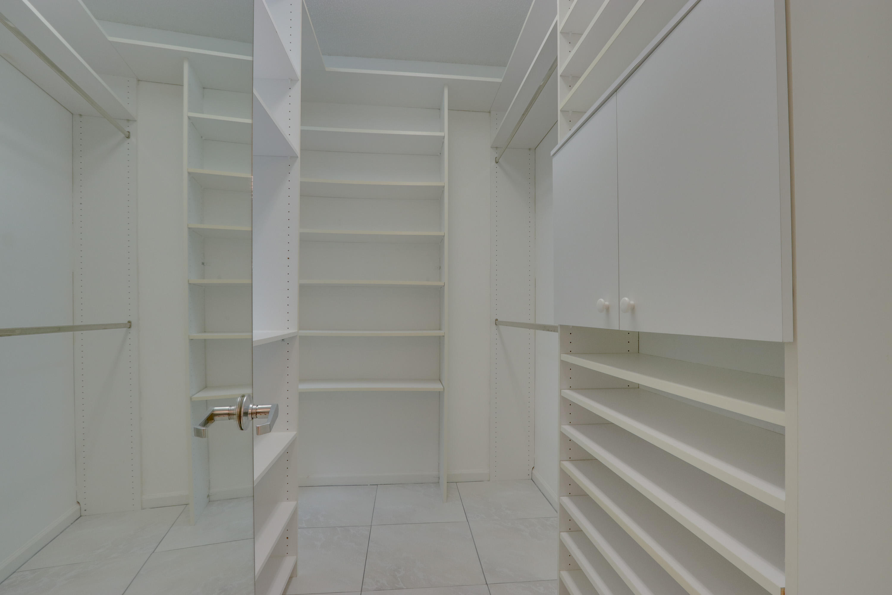 17031 Boca Club Boulevard, Unit 106A Boca Raton, FL 33487 - Photo 46 of 60 Master Walk-in Closet