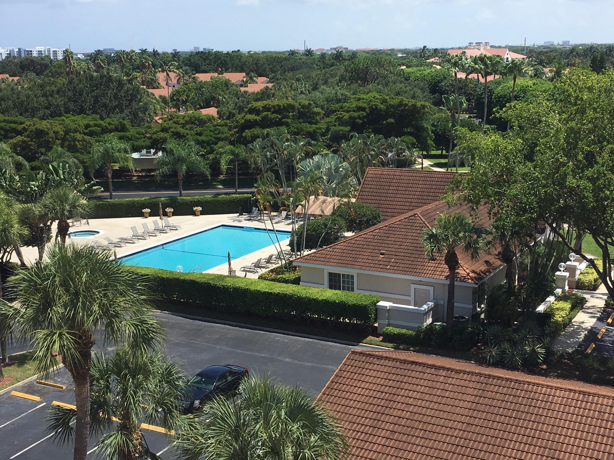 17031 Boca Club Boulevard, Unit 106A Boca Raton, FL 33487 - Photo 55 of 60 Spyglass Pool from unit 106-A