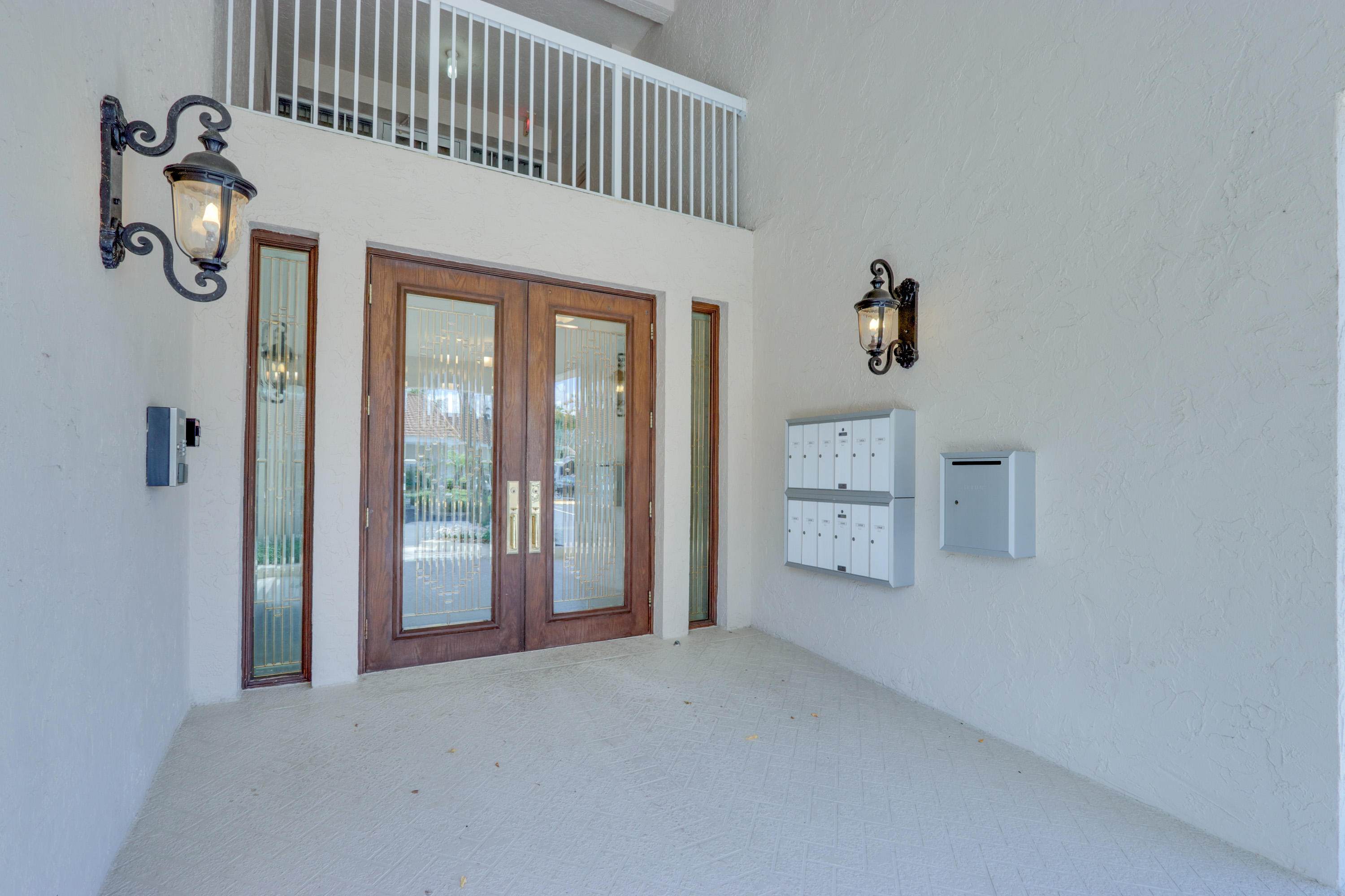 17031 Boca Club Boulevard, Unit 106A Boca Raton, FL 33487 - Photo 7 of 60 Building entrance 1
