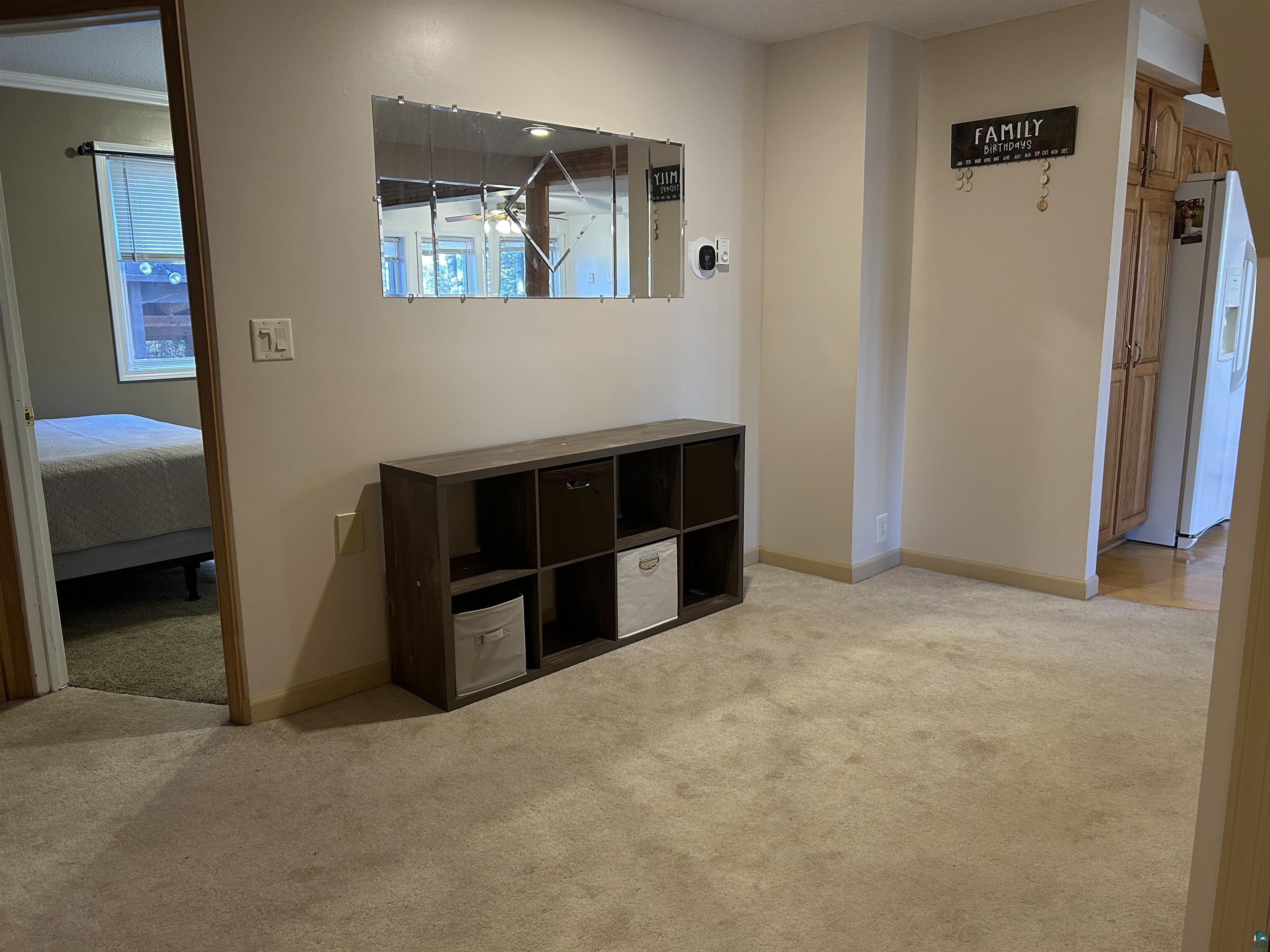 8655 South Lyman Lake Road South Range, WI 54874 - Photo 61 of 64 Corridor with light carpet and baseboards