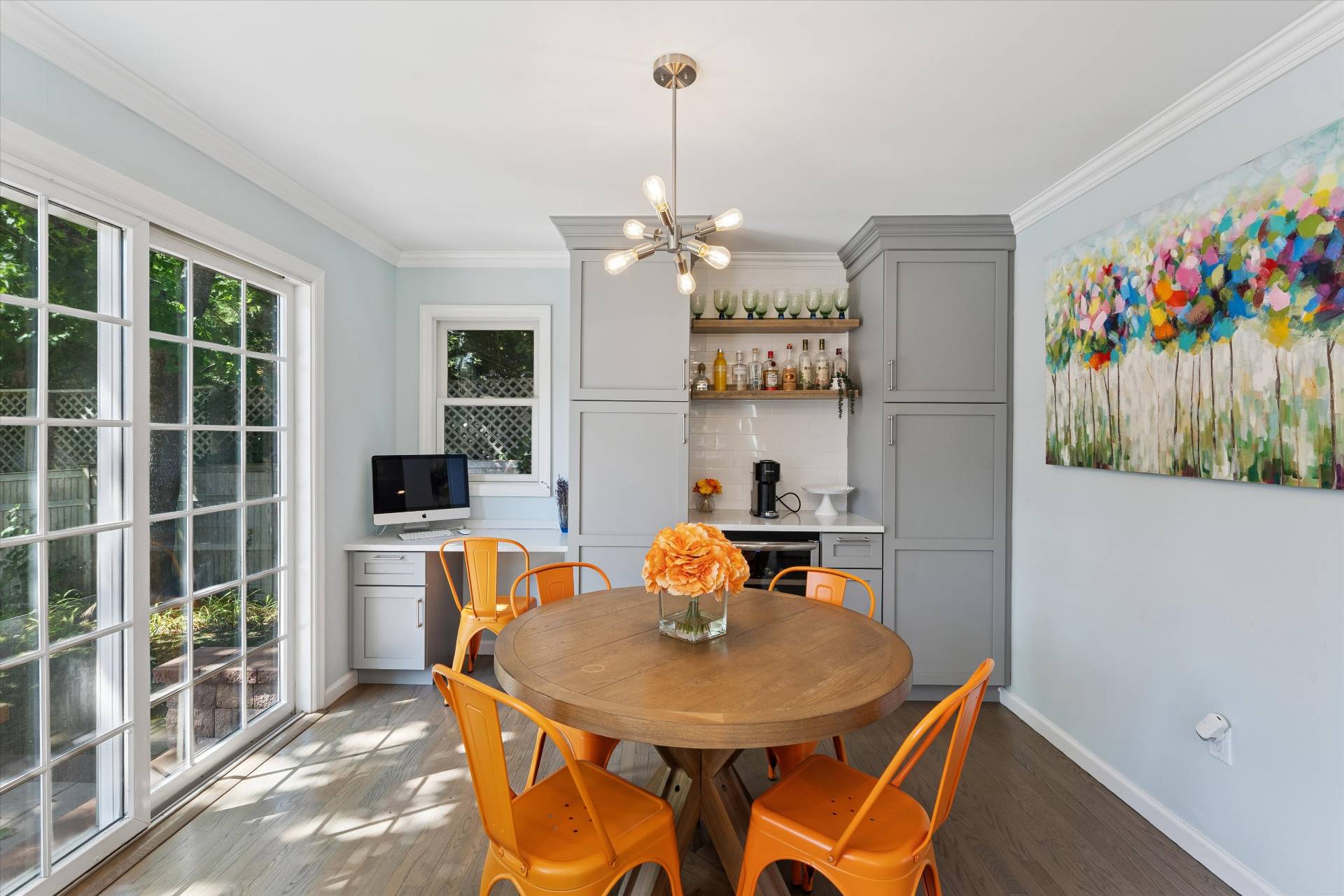 19 Maple Street Westhampton Beach, NY 11978 - Photo 6 of 23 a view of a dining room with furniture and a chandelier