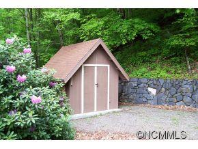 477 Rocky Top Road Maggie Valley, NC 28751 - Photo 6 of 20 a view of a backyard with garden