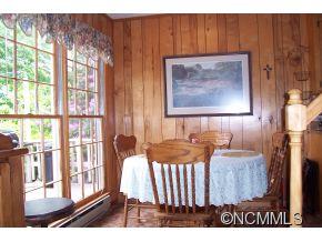 477 Rocky Top Road Maggie Valley, NC 28751 - Photo 10 of 20 a view of entryway and hall with wooden floor