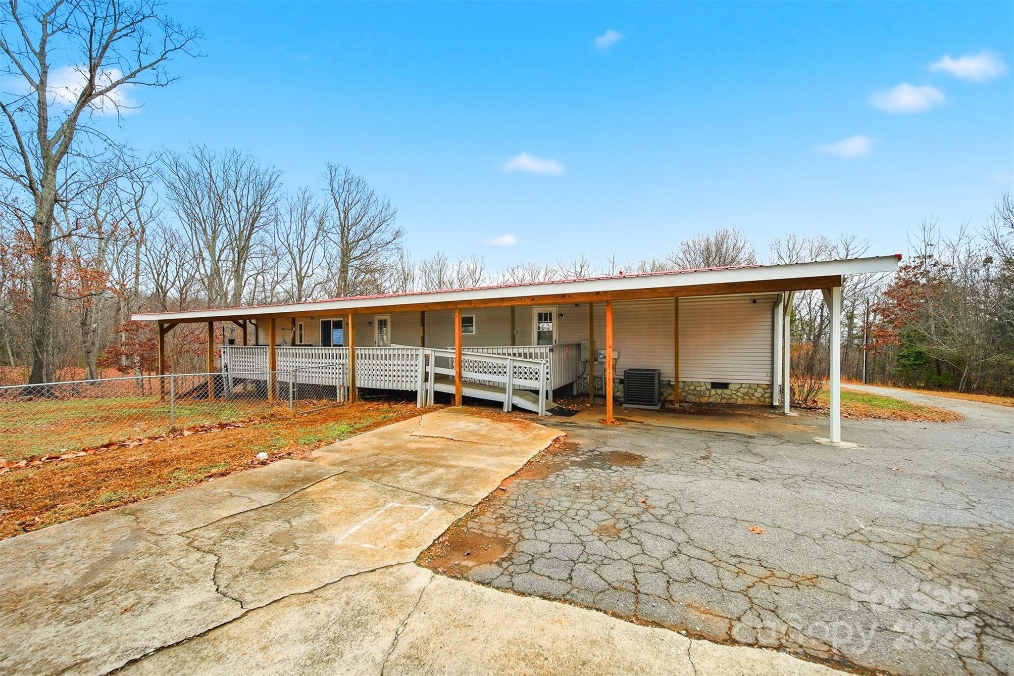 4915 Quartz Ridge Road Maiden, NC 28650 - Photo 27 of 38 a view of a house with a patio