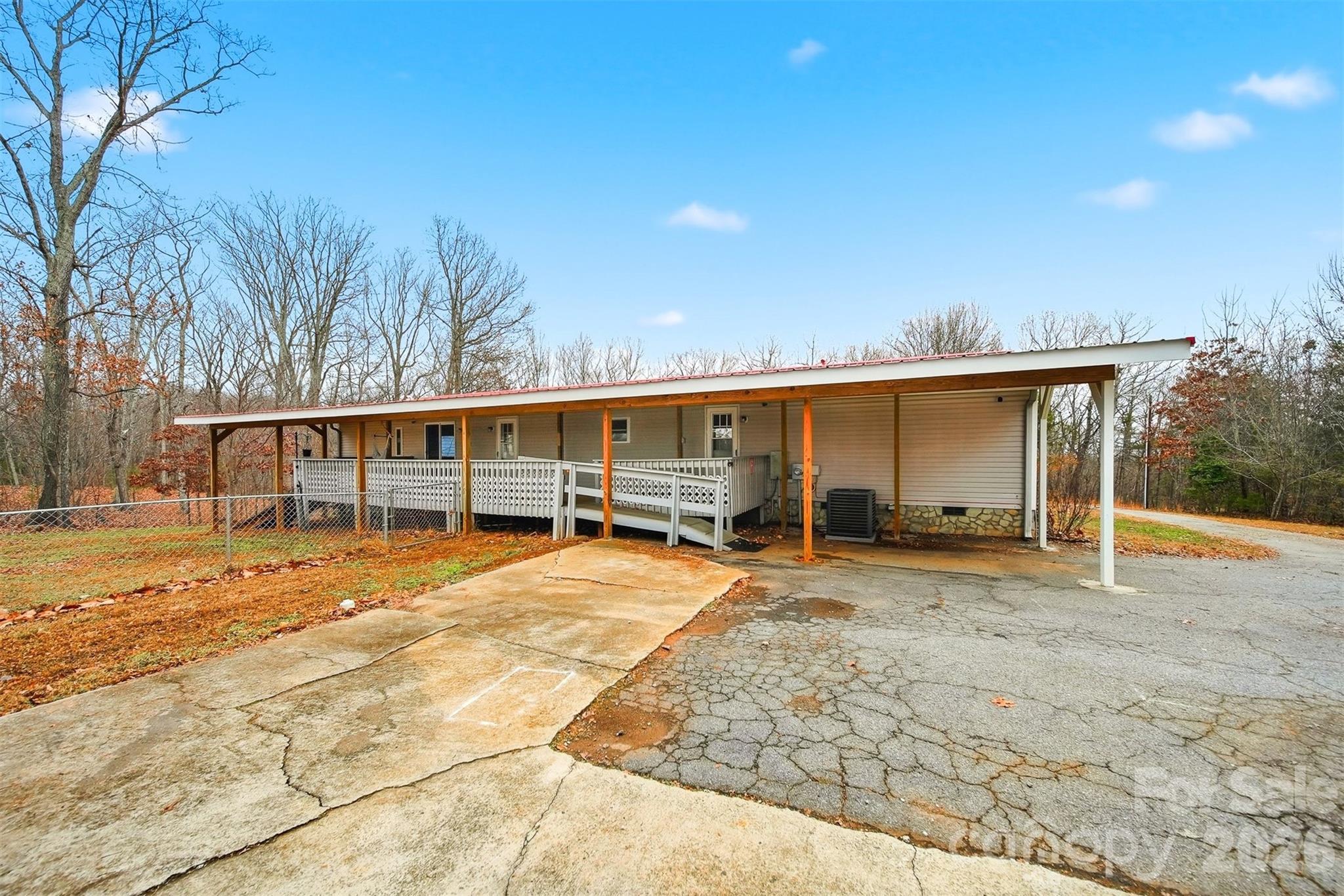 4915 Quartz Ridge Road Maiden, NC 28650 - Photo 27 of 38 a view of a house with a patio