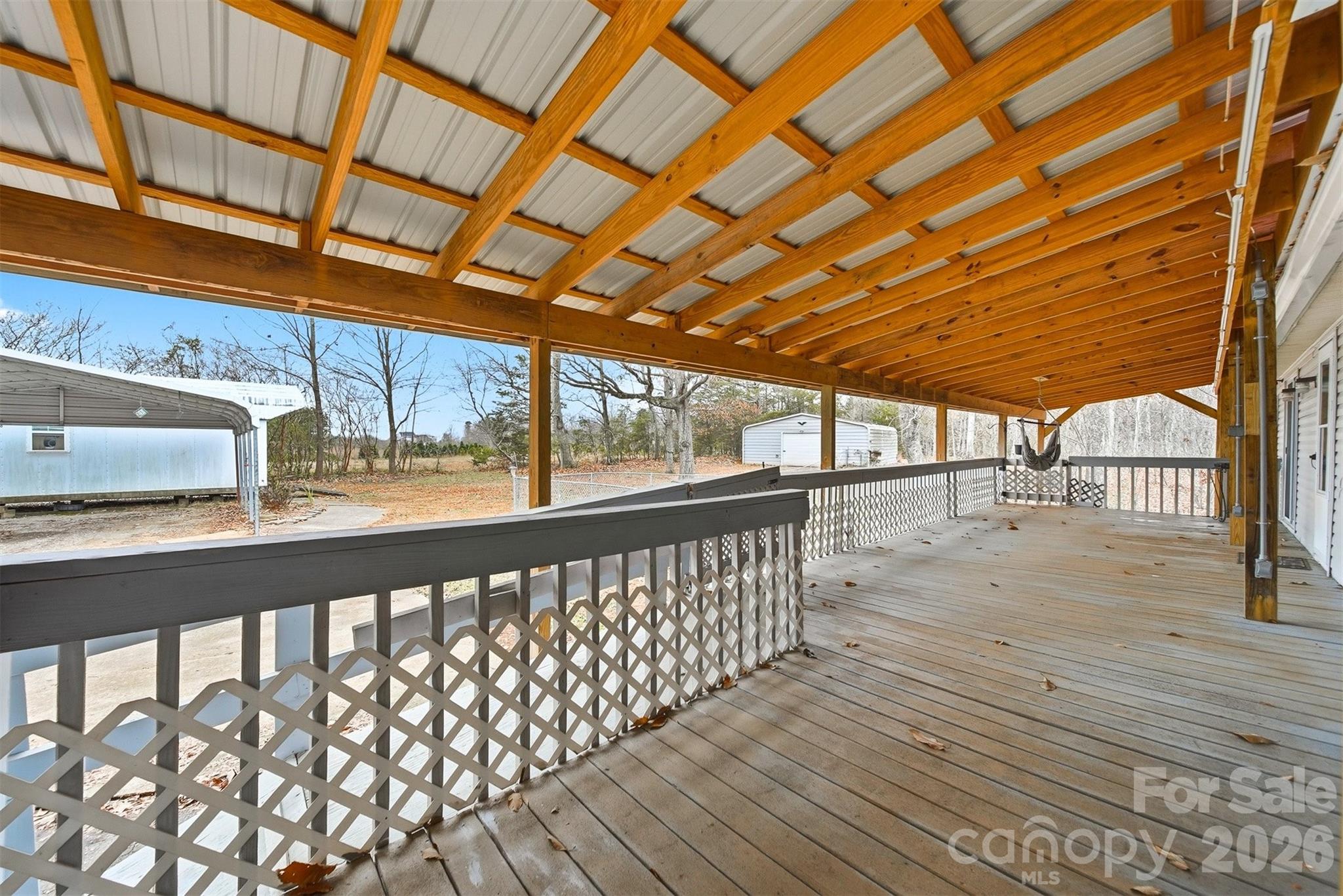 4915 Quartz Ridge Road Maiden, NC 28650 - Photo 28 of 38 a view of a porch with wooden floor
