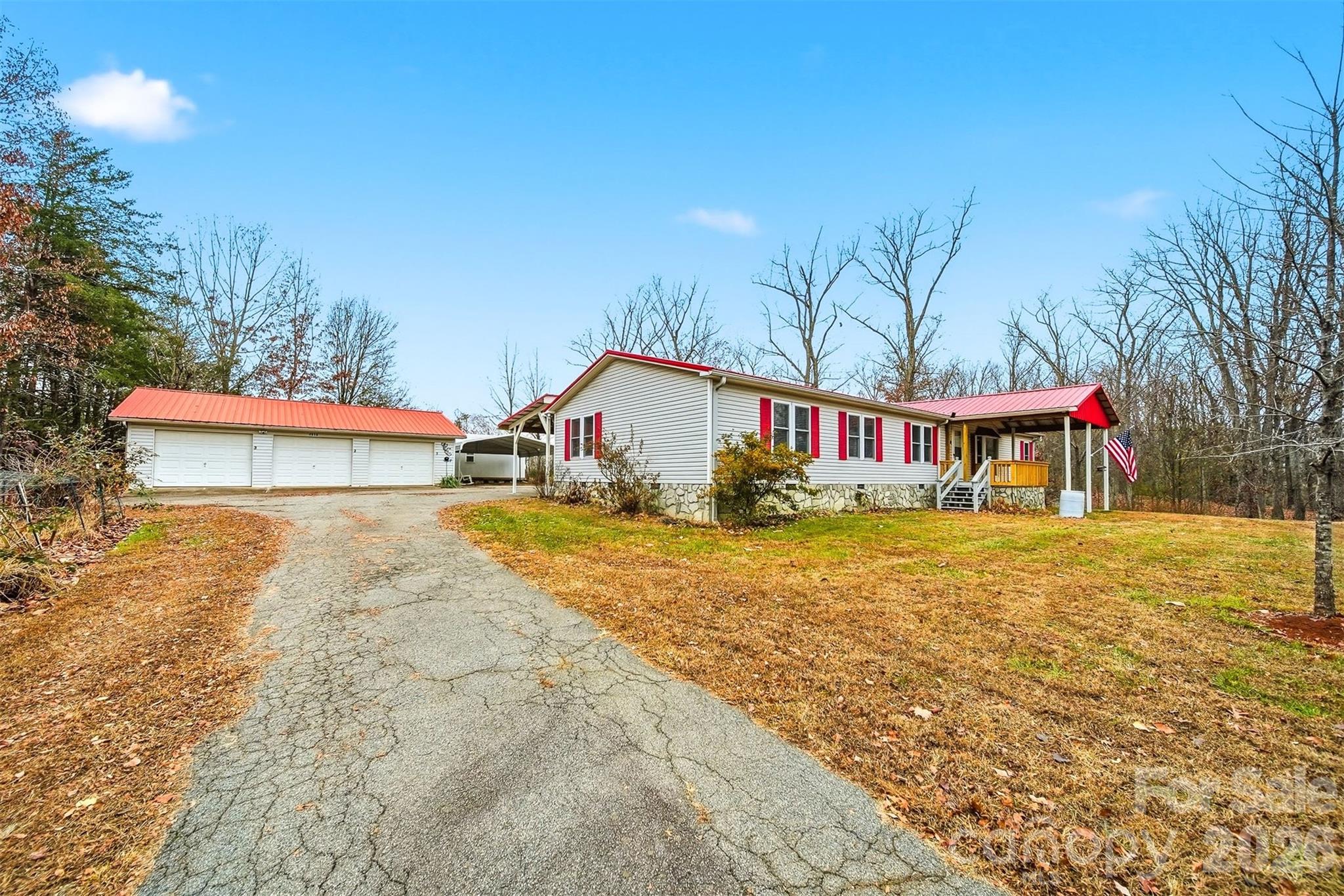 4915 Quartz Ridge Road Maiden, NC 28650 - Photo 3 of 38 a front view of house with yard and seating area