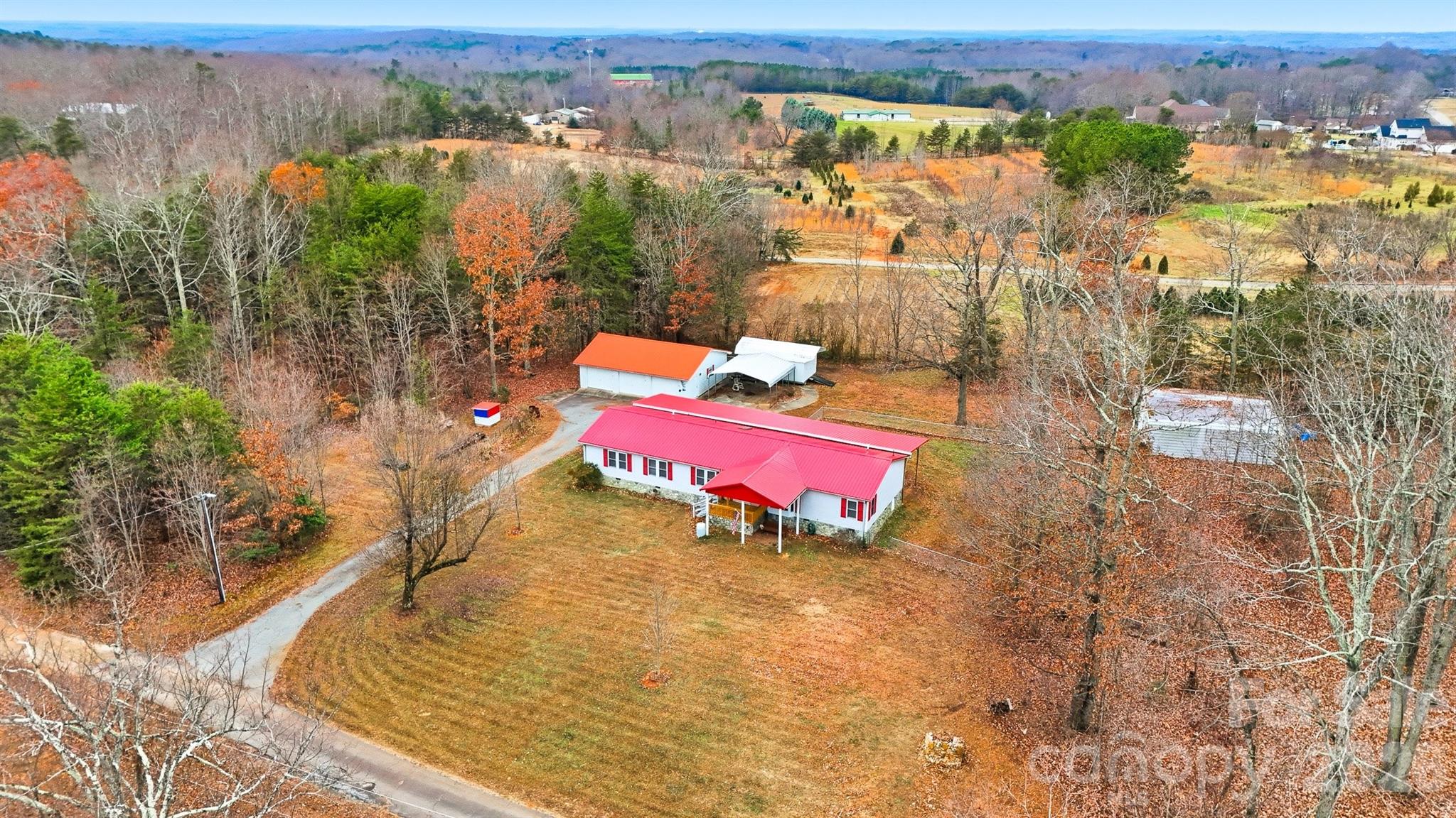 4915 Quartz Ridge Road Maiden, NC 28650 - Photo 33 of 38 an aerial view of a house with a ocean view