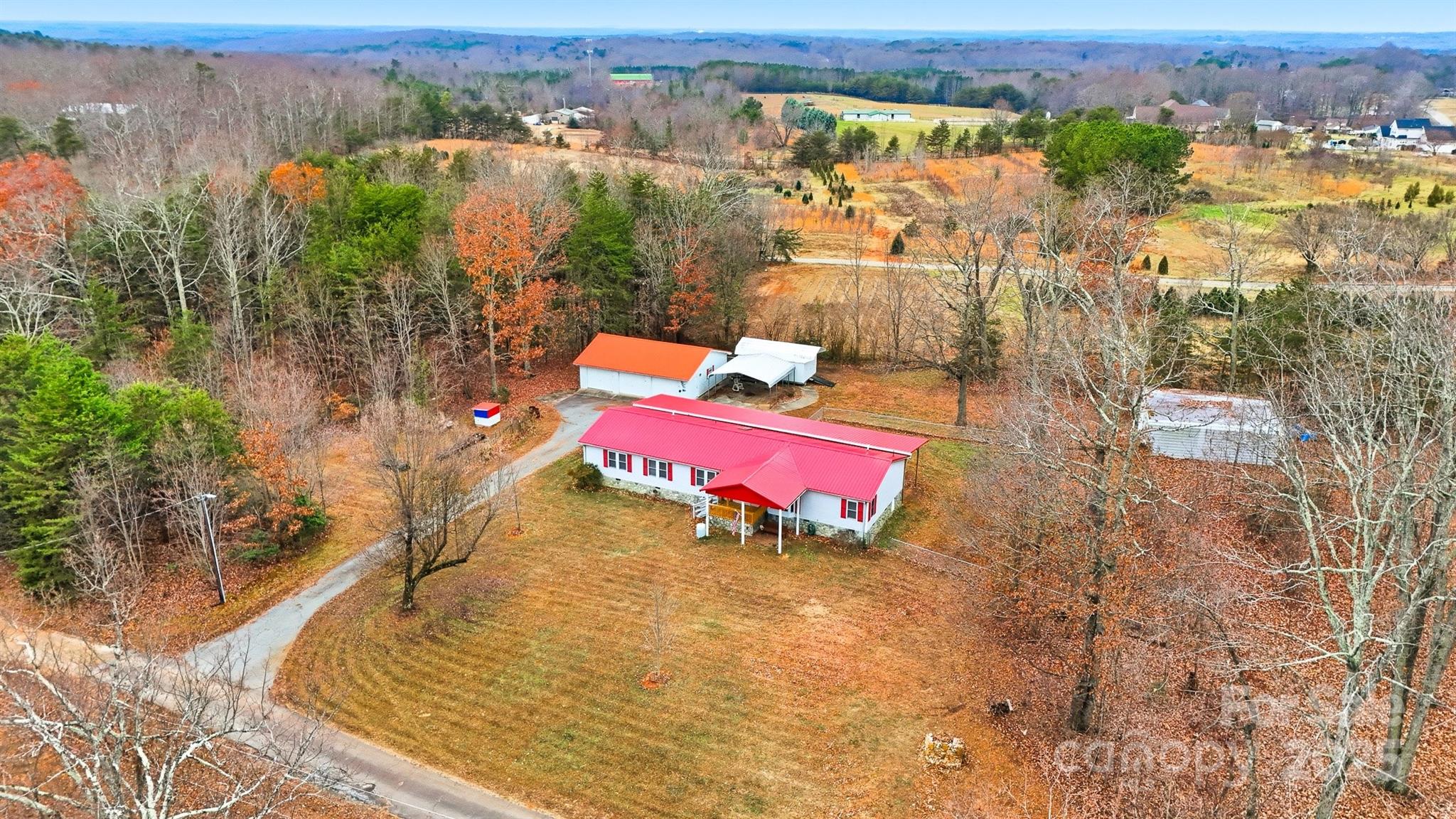 4915 Quartz Ridge Road Maiden, NC 28650 - Photo 33 of 38 an aerial view of a house with a ocean view