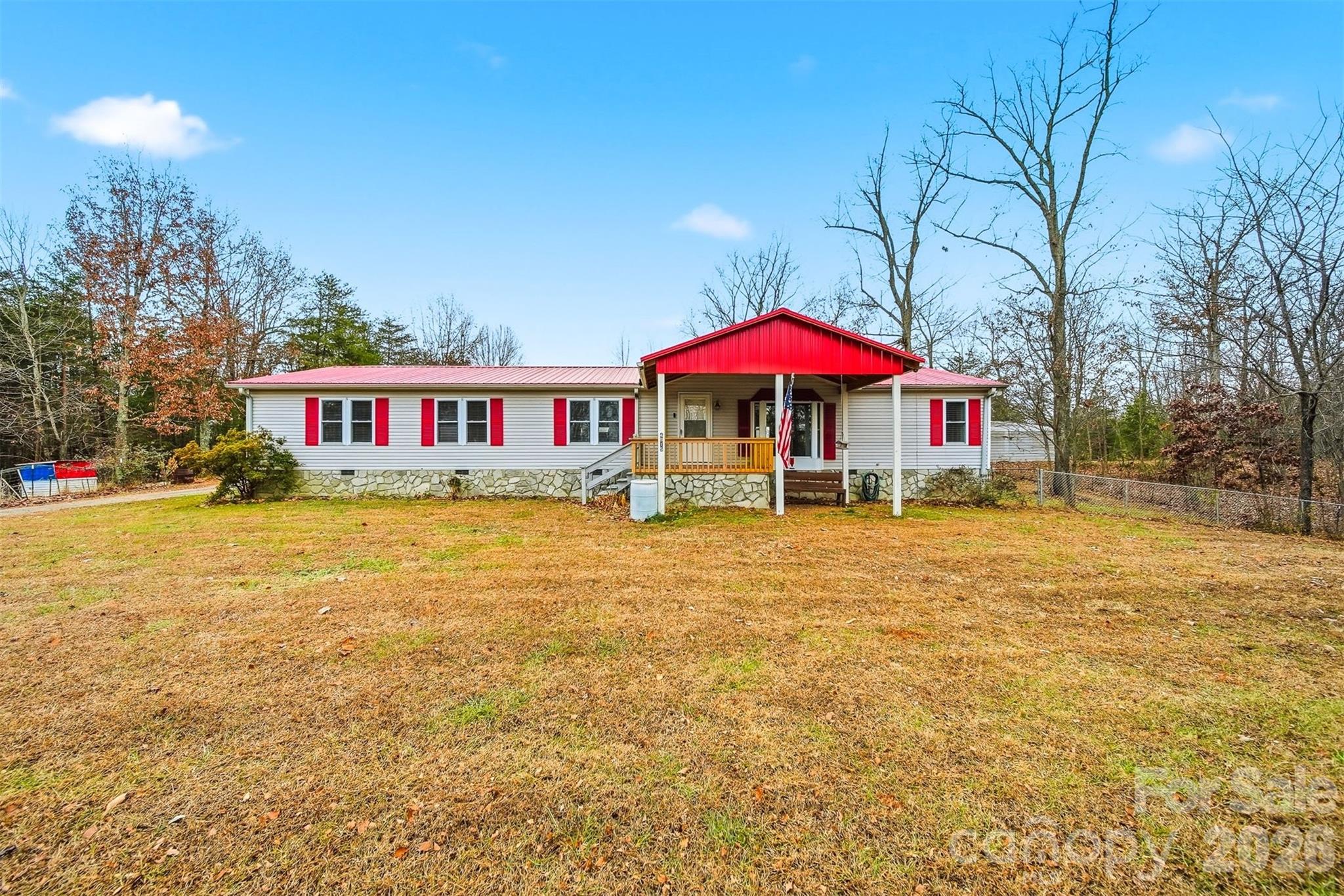 4915 Quartz Ridge Road Maiden, NC 28650 - Photo 38 of 38 a view of a house with a yard patio and fire pit
