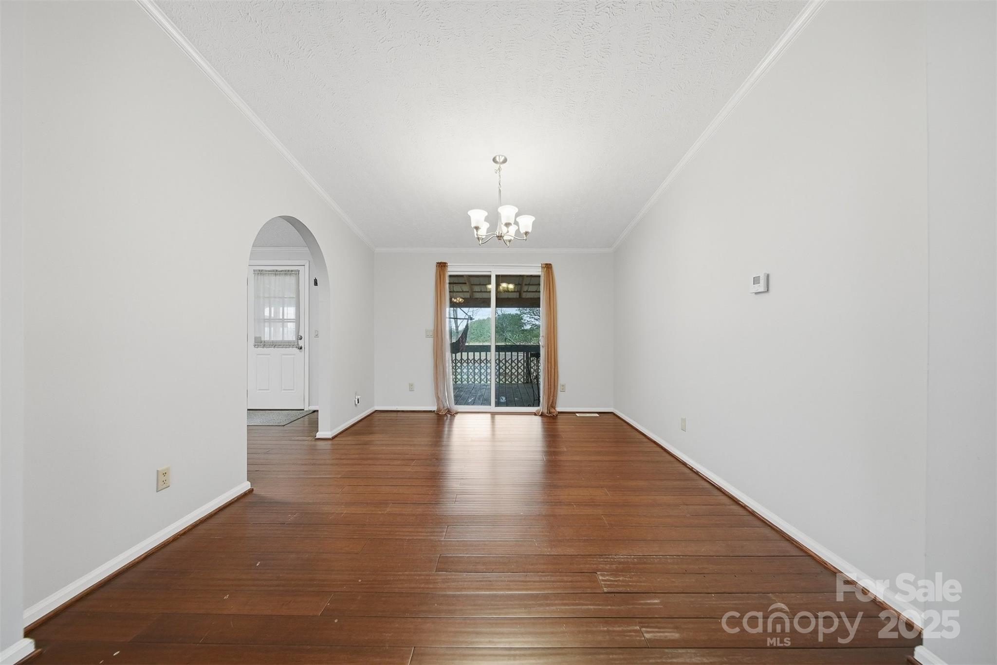4915 Quartz Ridge Road Maiden, NC 28650 - Photo 7 of 38 wooden floor in an empty room with a window