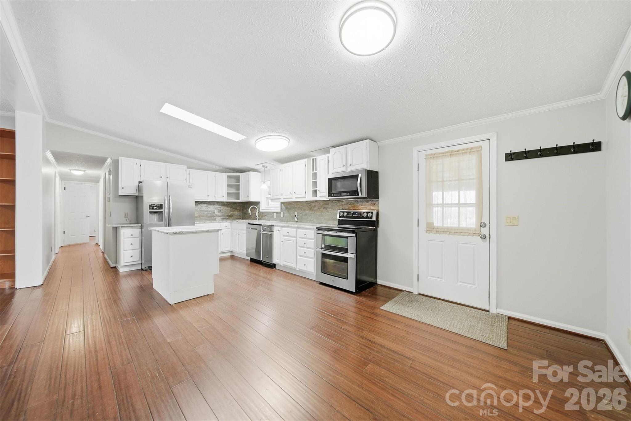 4915 Quartz Ridge Road Maiden, NC 28650 - Photo 8 of 38 a view of kitchen with wooden floor