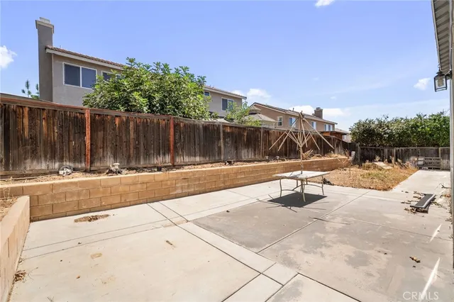 a view of swimming pool with a lounge chair