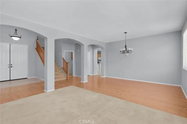 a view of a livingroom with a staircase
