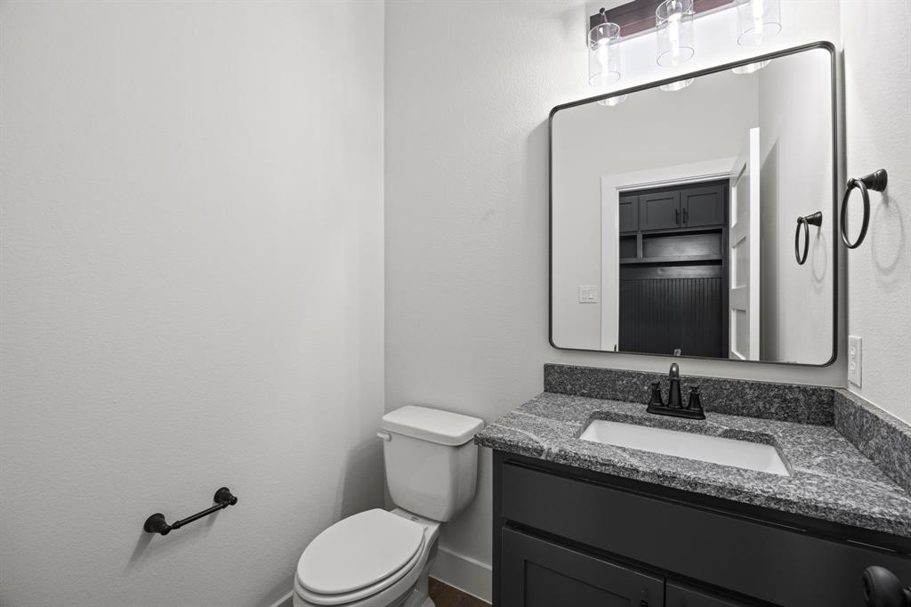 73 Dove Landing Rd Valley View Valley View, TX 76272 - Photo 27 of 30 Bathroom featuring vanity and a textured wall