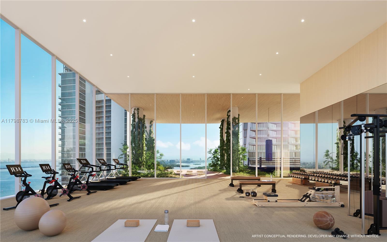 175 Northeast 10th Street, Unit 43O Miami, FL 33132 - Photo 25 of 35 a view of a room with gym equipment and floor to ceiling window