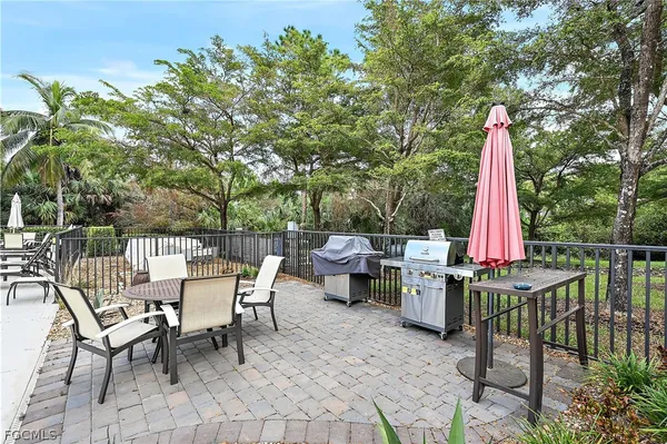 a view of a sitting area with furniture and wooden deck