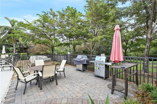 a view of a sitting area with furniture and wooden deck