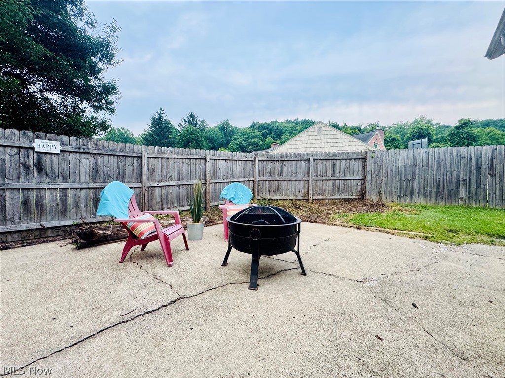 956 Braun Road Belpre, OH 45714 - Photo 41 of 44 PATIO IN THE BACK LEFT OF PROPERTY W PRIVACY FENCE FROM NEIGHBORS IN THE BACK
