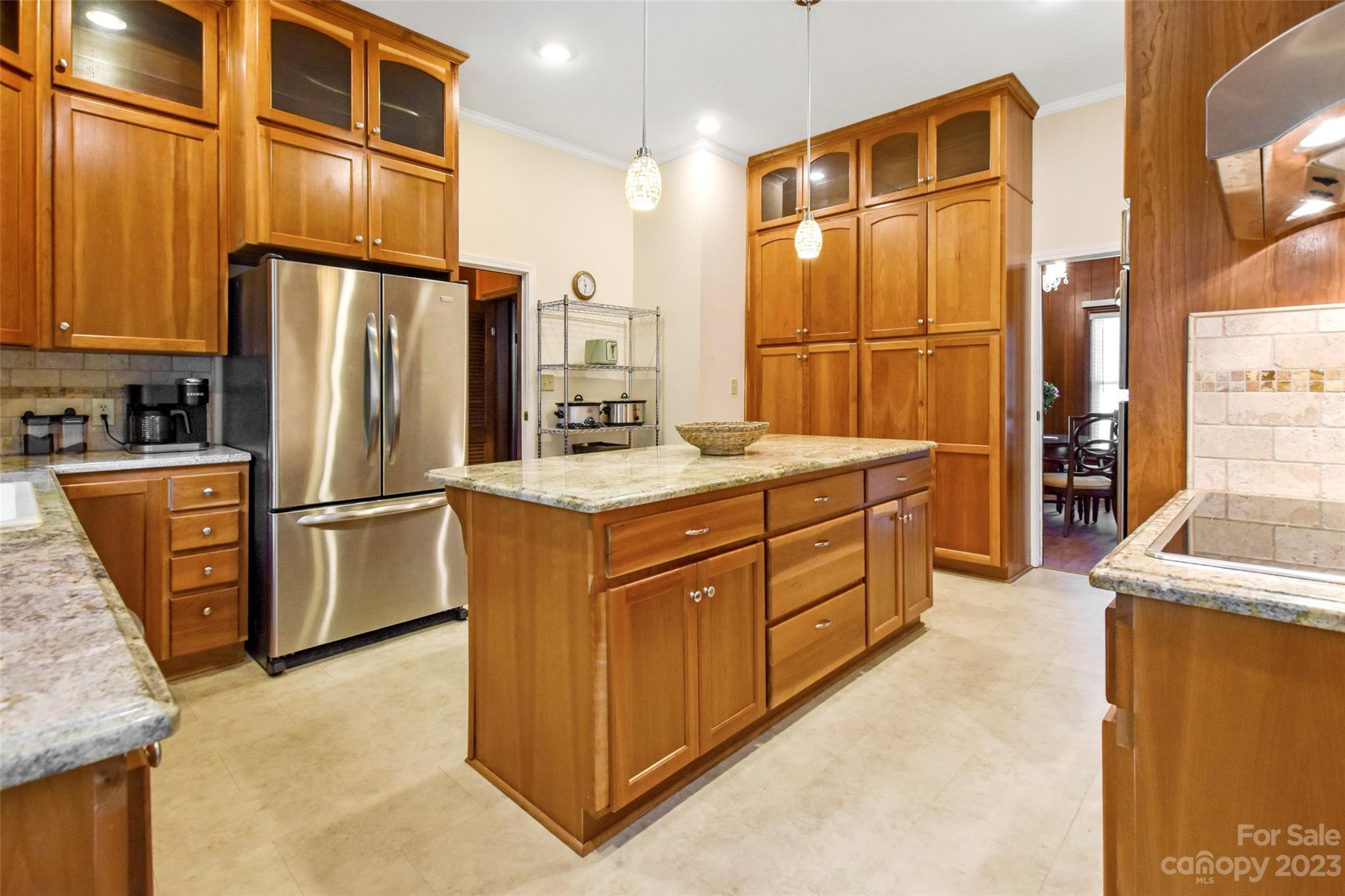 3199 Greenwood Road Rock Hill, SC 29730 - Photo 13 of 33 a kitchen with stainless steel appliances granite countertop a refrigerator a stove and a sink