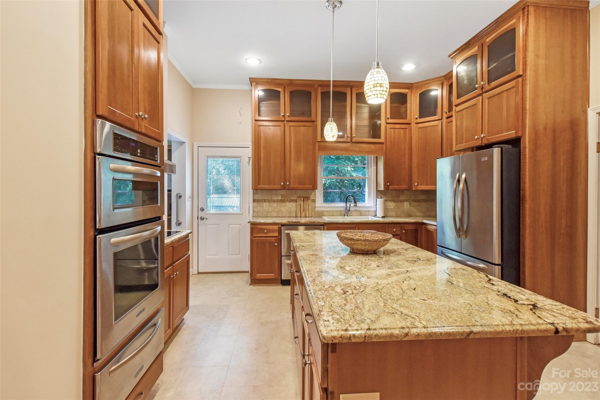 3199 Greenwood Road Rock Hill, SC 29730 - Photo 15 of 33 a kitchen with stainless steel appliances granite countertop a refrigerator and a stove