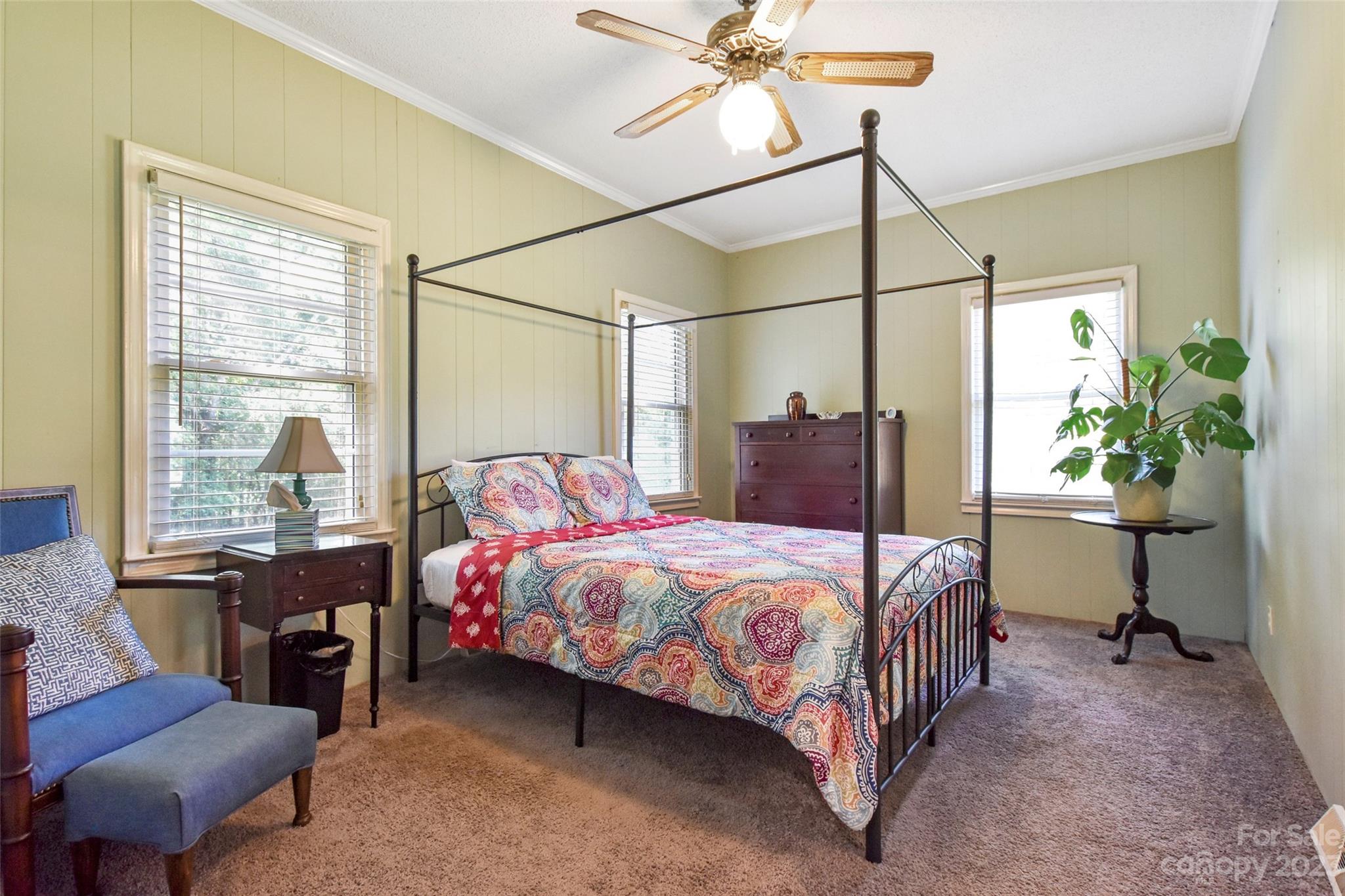 3199 Greenwood Road Rock Hill, SC 29730 - Photo 18 of 33 a bedroom with a bed table chair and window
