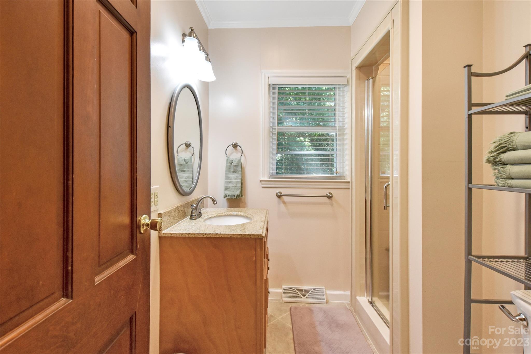 3199 Greenwood Road Rock Hill, SC 29730 - Photo 19 of 33 a bathroom with a sink and a mirror