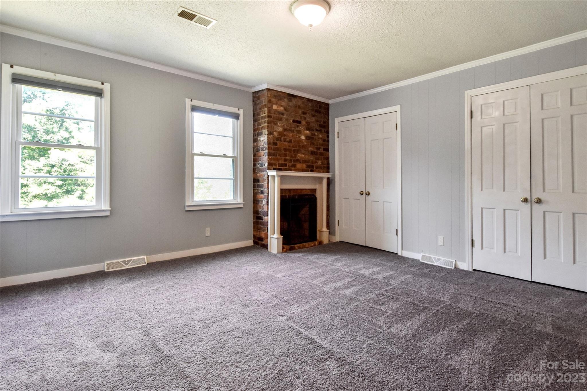 3199 Greenwood Road Rock Hill, SC 29730 - Photo 20 of 33 an empty room with windows and fireplace