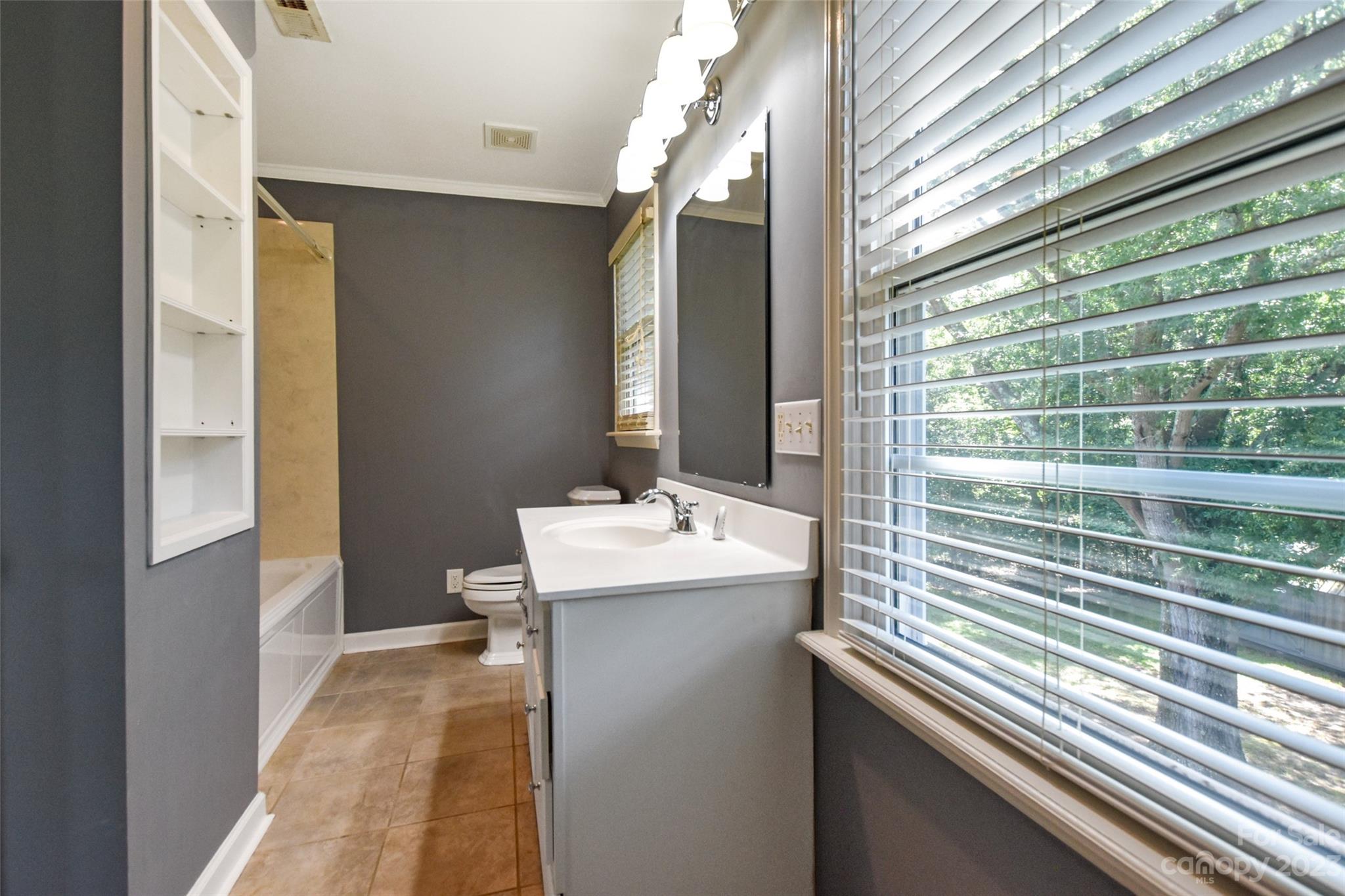 3199 Greenwood Road Rock Hill, SC 29730 - Photo 21 of 33 a bathroom with a sink and a mirror