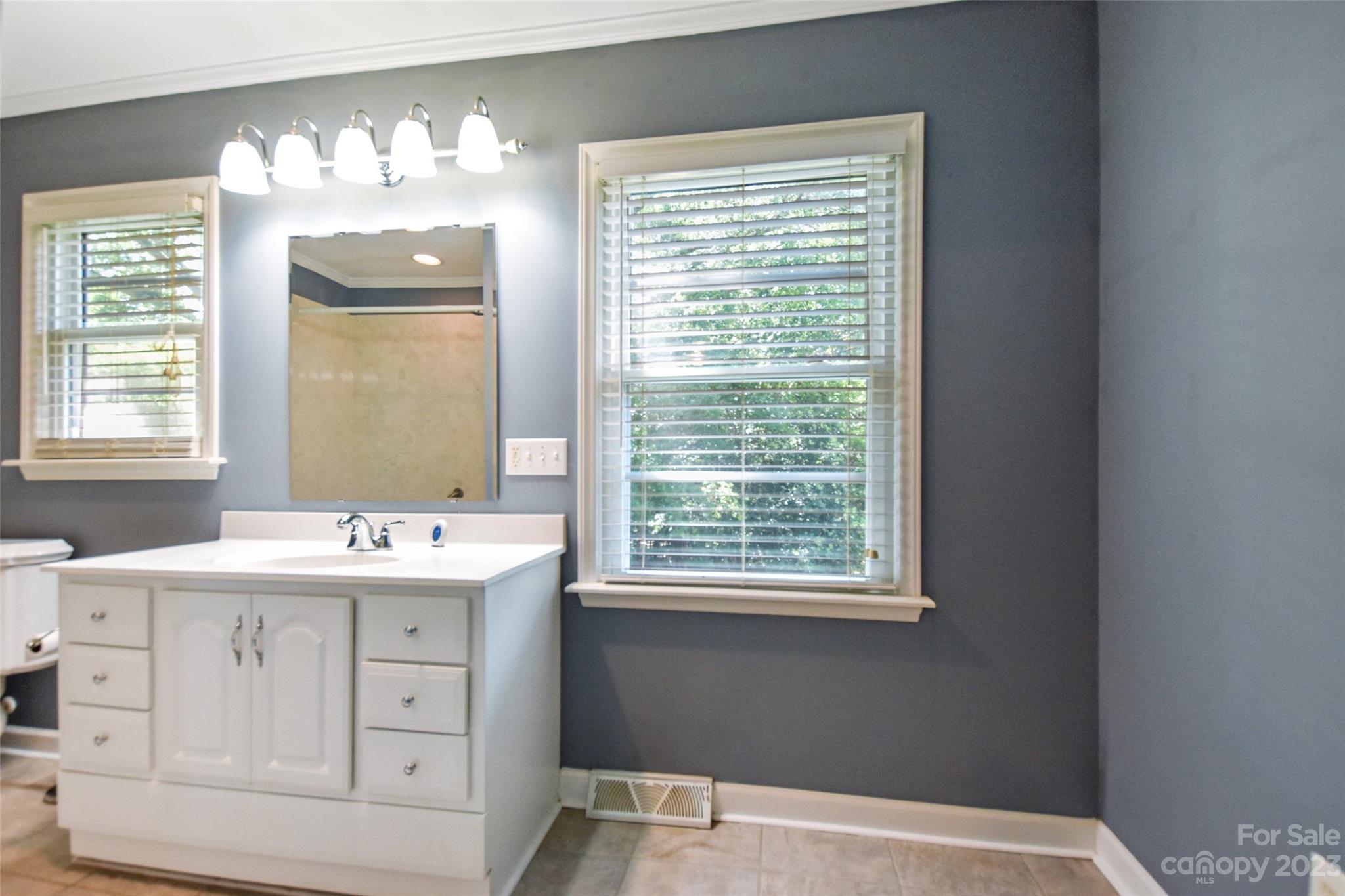 3199 Greenwood Road Rock Hill, SC 29730 - Photo 22 of 33 a room with a window cabinets and chandelier