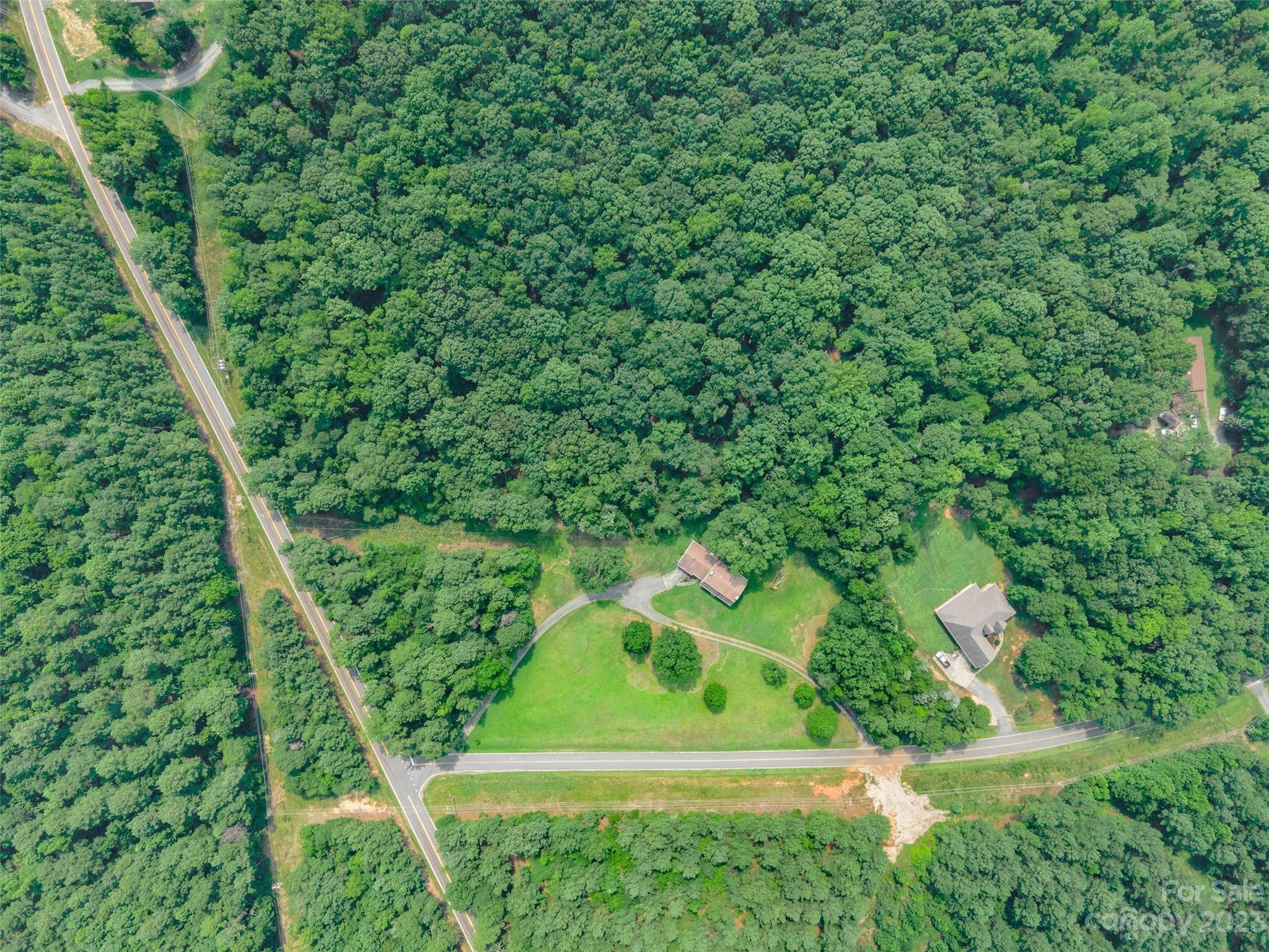 3199 Greenwood Road Rock Hill, SC 29730 - Photo 31 of 33 a green field with lots of bushes