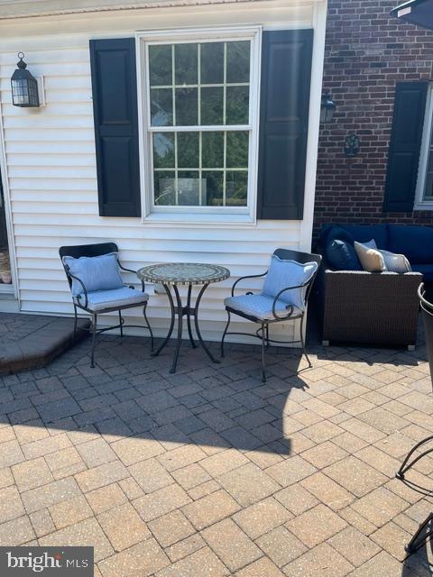 235 Hopkins Road Haddonfield, NJ 08033 - Photo 37 of 47 a backyard of a house with seating space